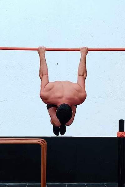 Supine tucked back lever