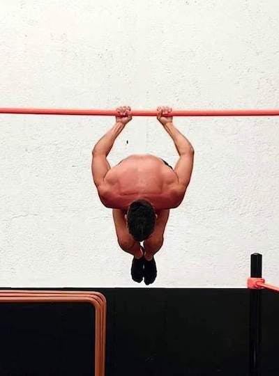 Tucked back lever pull ups with close grip