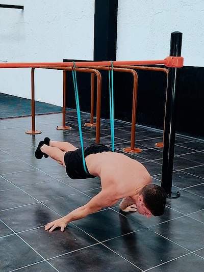 Full planche assisted with elastic band