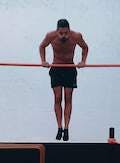 Jump-assisted muscle up